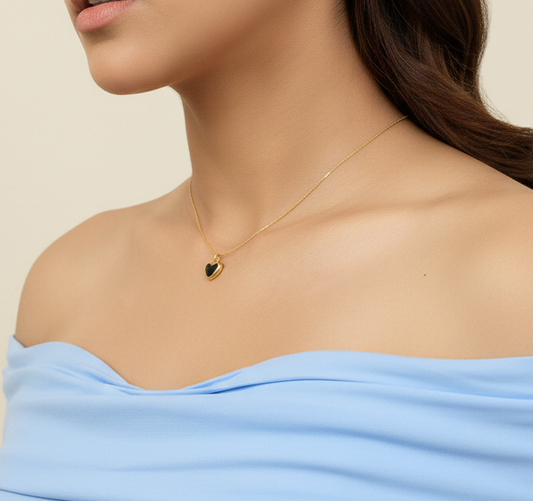 Close-up of gold heart pendant on cavicle chain – Sri Lanka jewellery