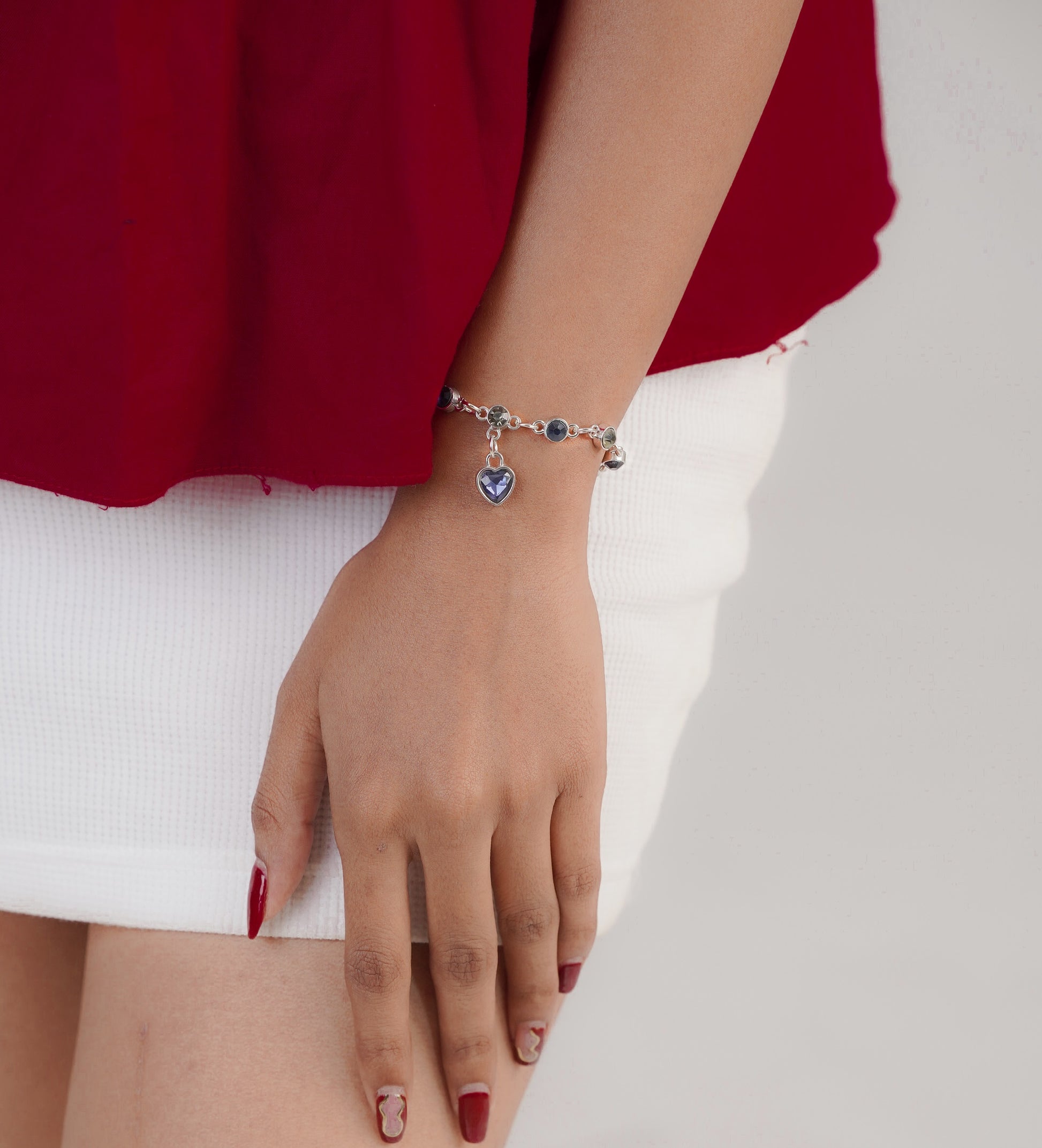 Side view of blue and silver charms bracelet for women – Luxteno Sri Lanka