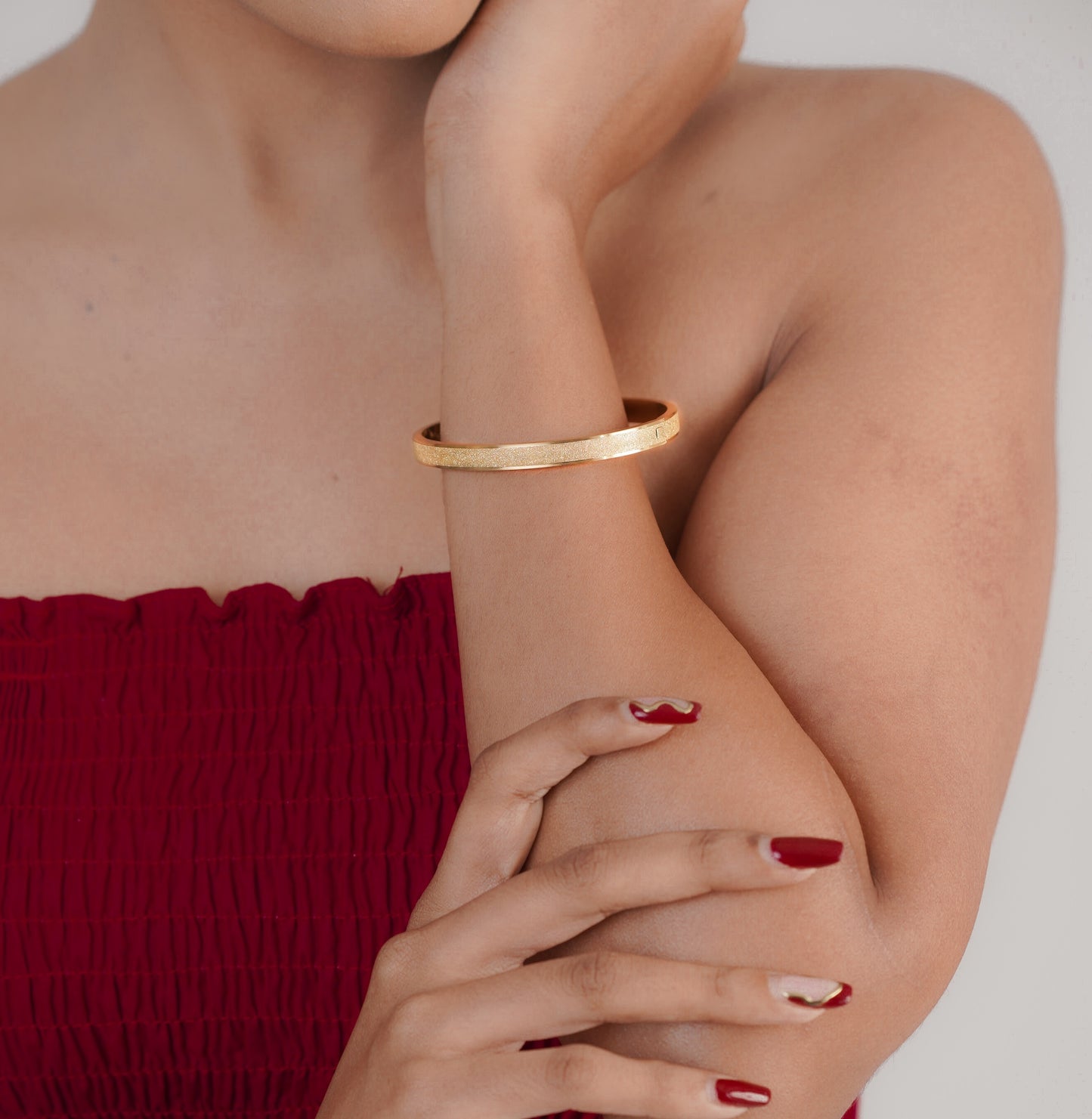 Close-up of gold and silver stars bracelet on wrist – Sri Lanka jewellery