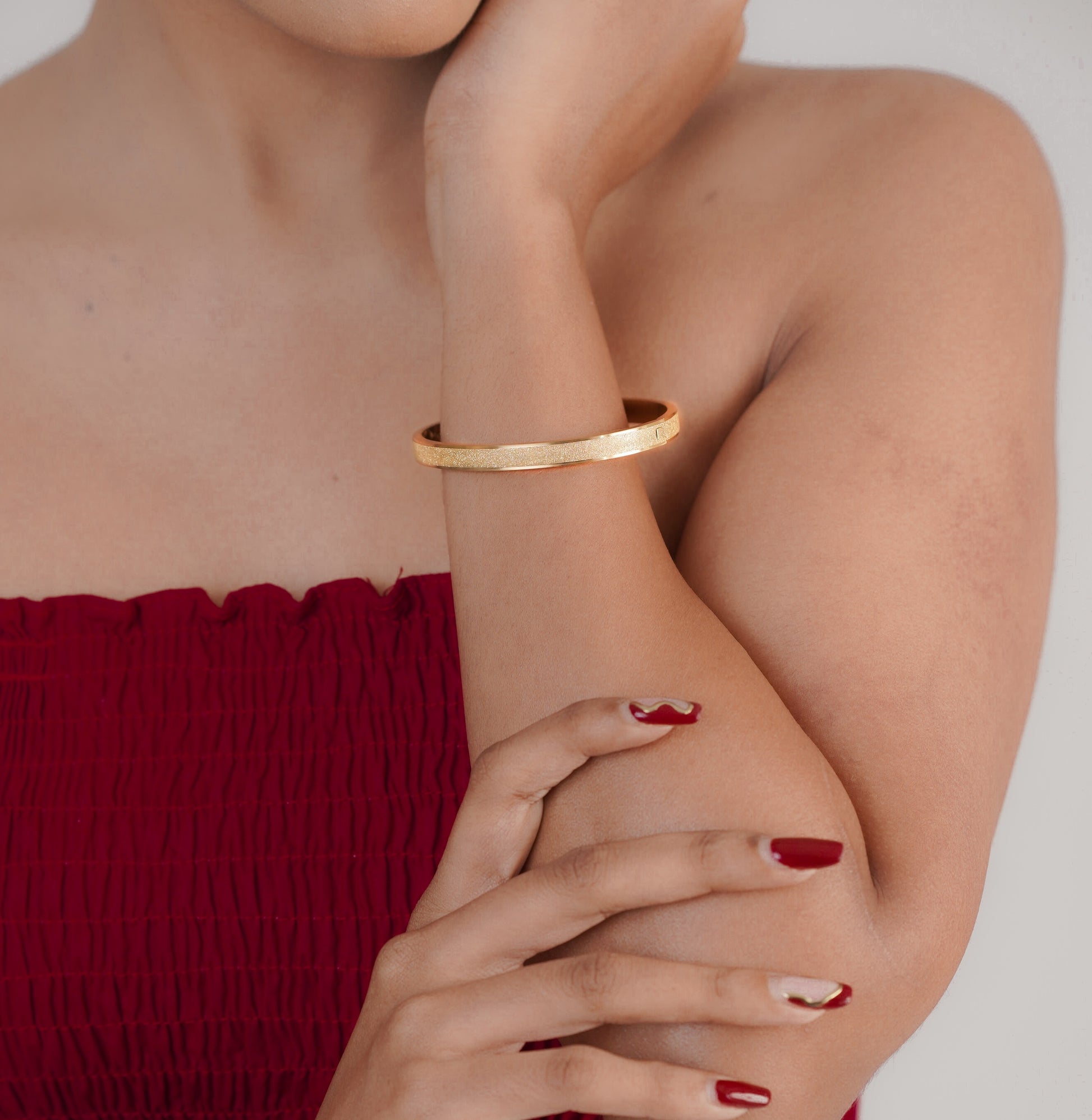 Close-up of gold and silver stars bracelet on wrist – Sri Lanka jewellery