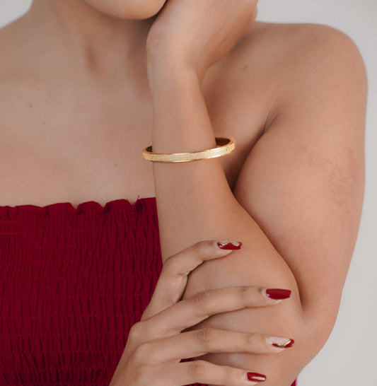 Close-up of gold and silver stars bracelet on wrist – Sri Lanka jewellery