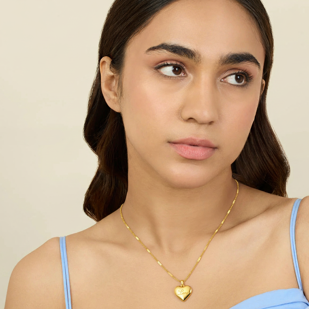 Close-up of 18k gold engraved heart pendant necklace – Sri Lanka jewellery
