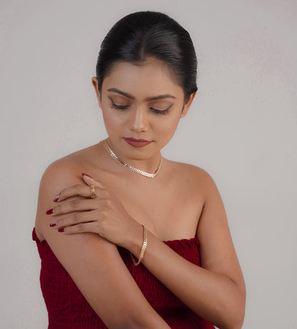 Close-up of gold leaf pendant and bracelet – Sri Lanka jewellery