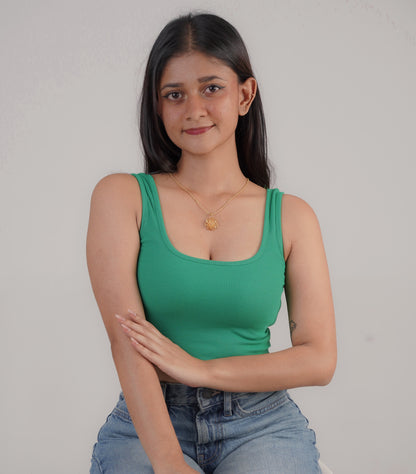 Gold peacock necklace on neck with green dress – Luxteno Sri Lanka