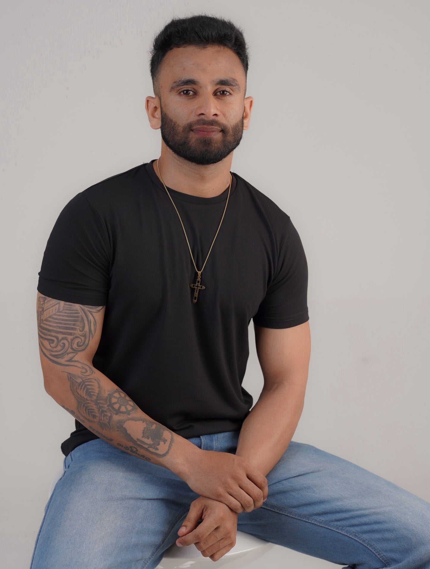 Close-up of 18k gold plated cross pendant on chain – Sri Lanka jewellery