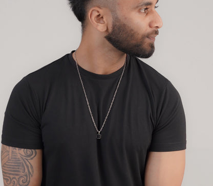 Men's black pendant necklace styled with black t-shirt – Luxteno Sri Lanka