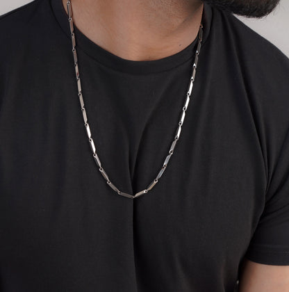 Close-up of men's silver snake chain necklace on neck – Sri Lanka jewellery