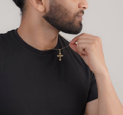 Close-up of ruby stone cross pendant on gold chain – Sri Lanka jewelleryClose-up of ruby stone cross pendant on gold chain – Sri Lanka jewellery