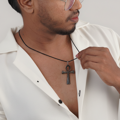 Close-up of matte black stainless-steel cross pendant on chain – Sri Lanka jewellery
