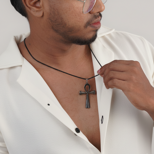 Close-up of matte black stainless-steel cross pendant on chain – Sri Lanka jewellery
