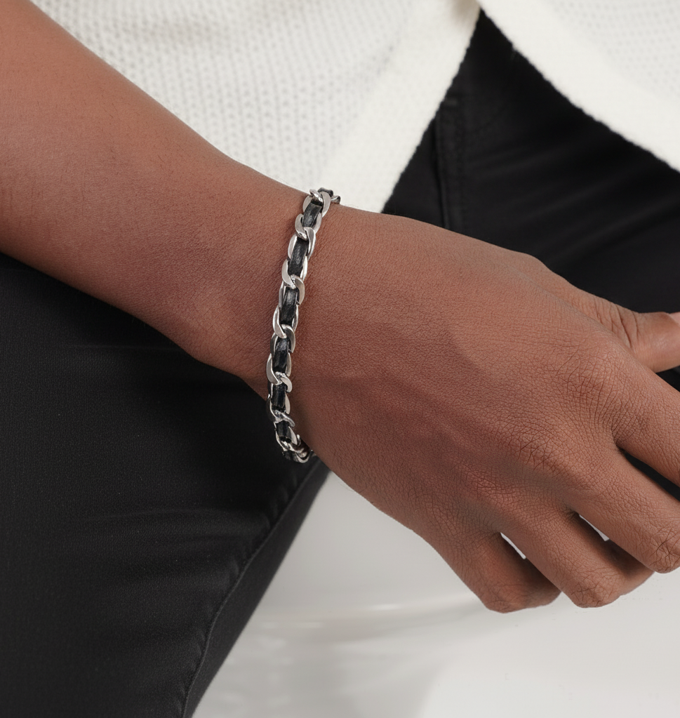 Hand wearing a close-up of a double snake chain bracelet on a man's wrist – Sri Lankan jewellery