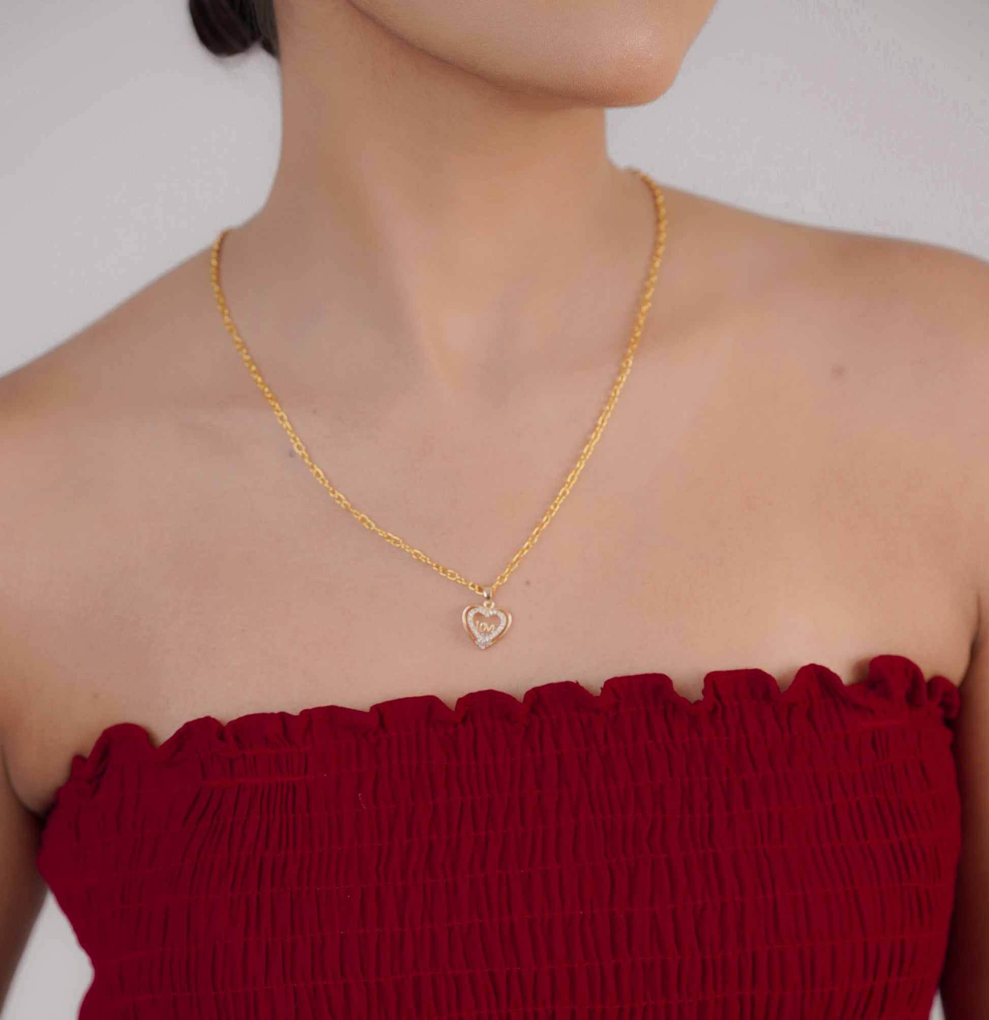 Minimalist scallop shell pendant necklace on neck – Luxteno Sri Lanka