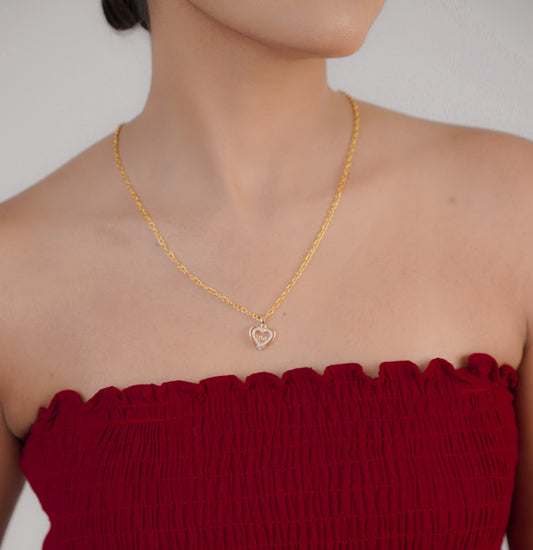 Minimalist scallop shell pendant necklace on neck – Luxteno Sri Lanka