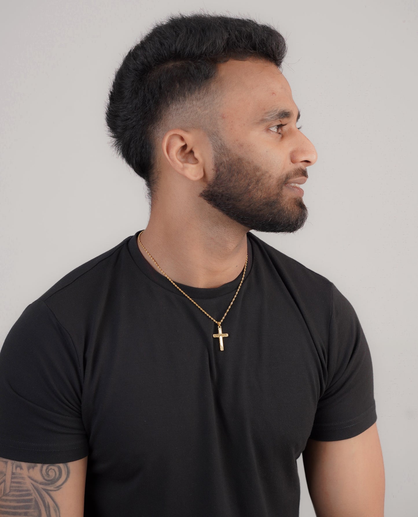 Men's gold rope cross necklace over black t-shirt – Luxteno Sri Lanka