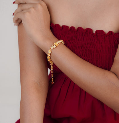 Rose gold leaf bracelet styled with red outfit – Luxteno Sri Lanka