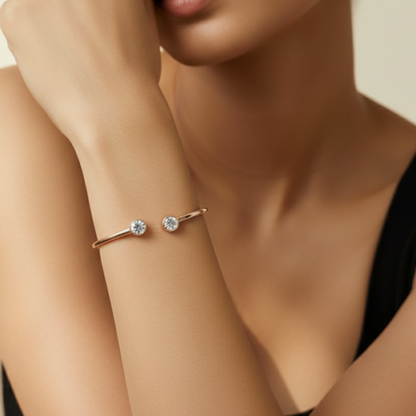 Woman wearing rose gold open bangle bracelet with beige background – Luxteno Sri Lanka