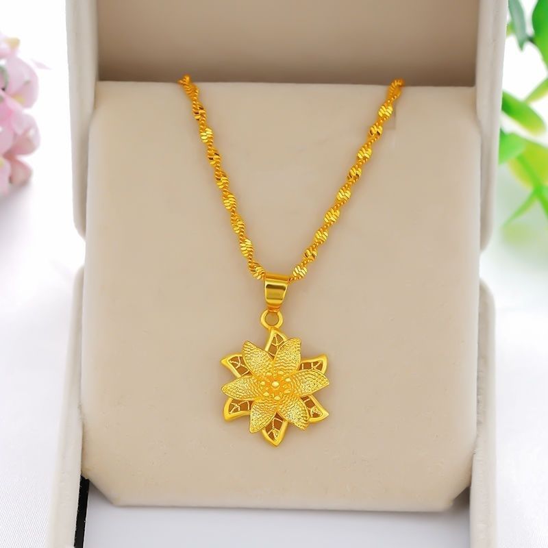 Gold star leaf necklace displayed on white background – Sri Lanka jewellery